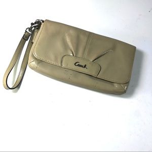 Women Coach patent leather wristlet/clutch nude